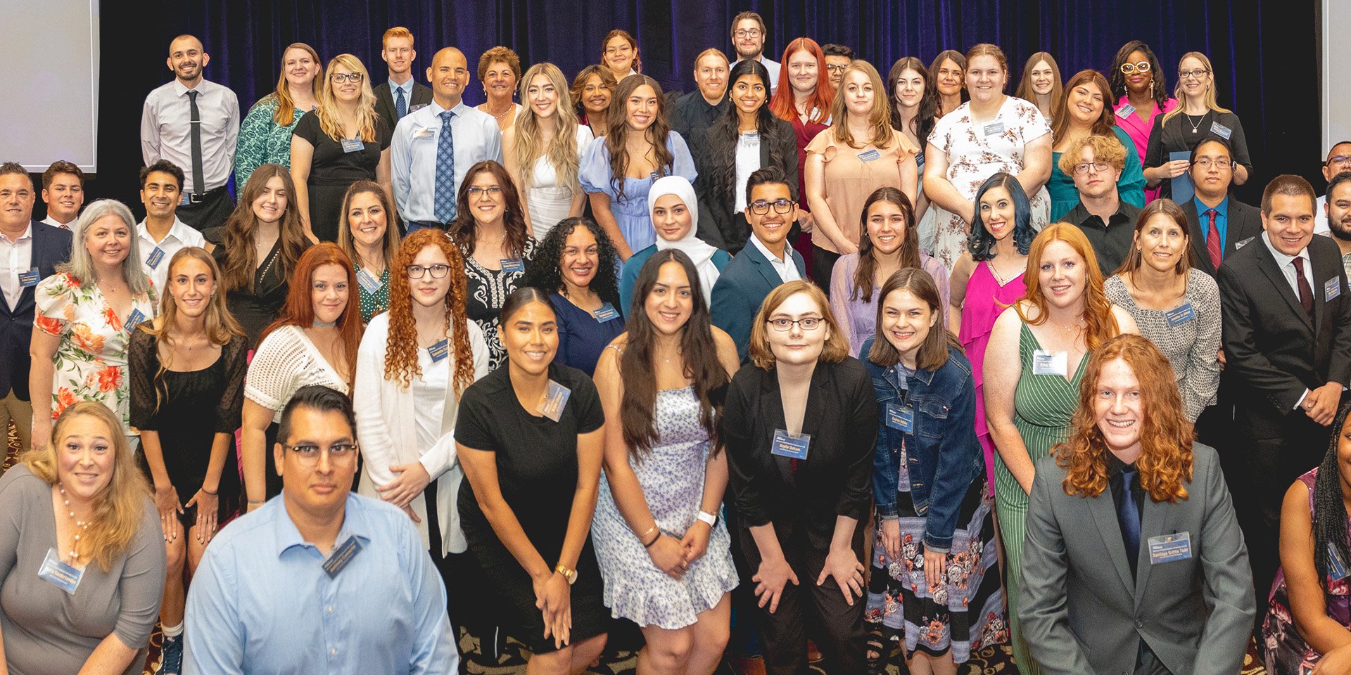 Group photo featuring about 53 of Desert Financial's scholarship recipients, a diverse and accomplished assembly of students whose academic achievements have been recognized and supported by the credit union's multiple scholarship programs.