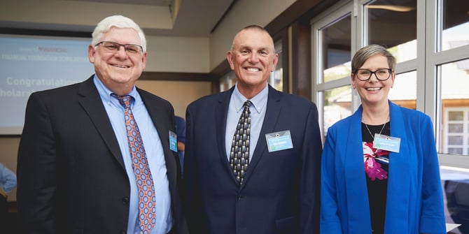 From left to right: Jeff Meshey (President & CEO), Ron Amstutz (Executive Vice President), and Cathy Graham (Executive Vice President) smiling for the camera.