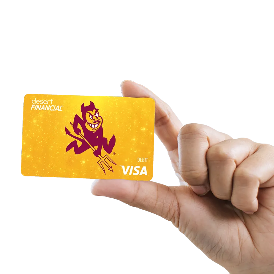 A hand holding an ASU debit card