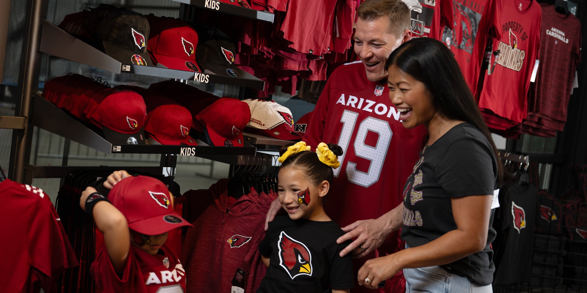 Cardinals fans buying new Cardinals gear at the Team Shop