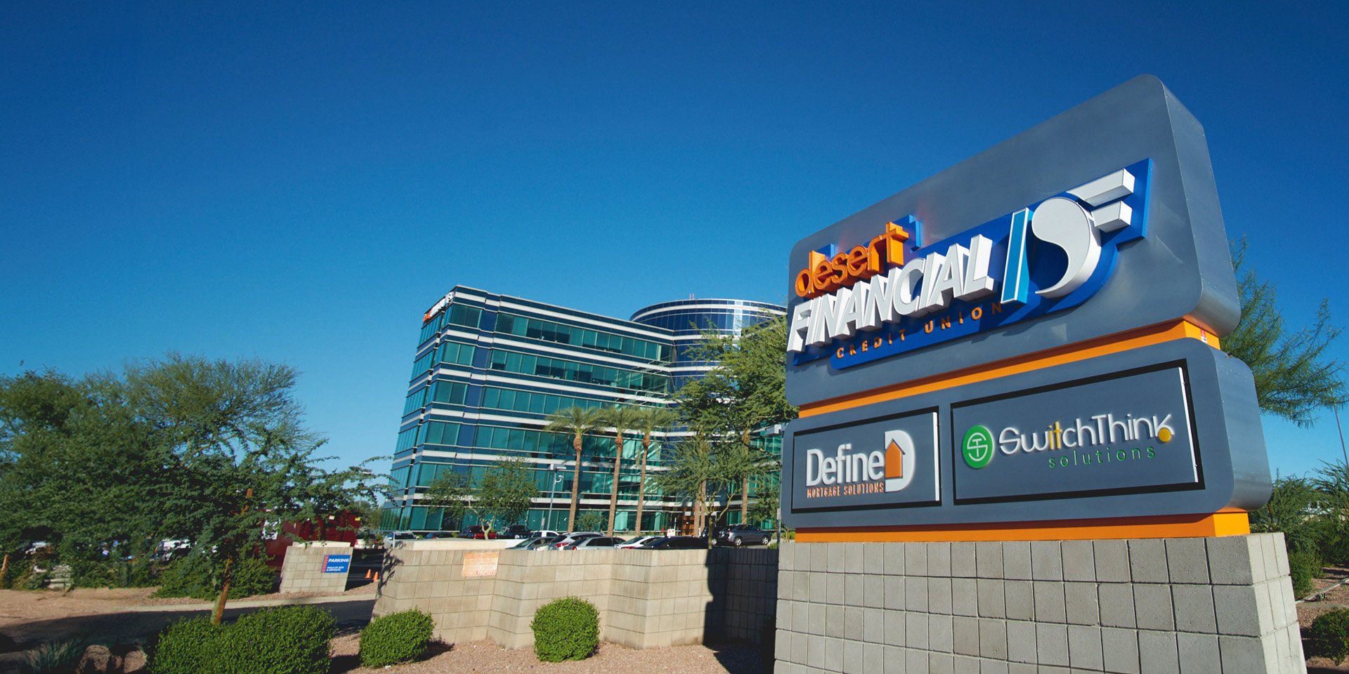 Desert Financial's headquarters features a contemporary exterior with distinctive architecture, reflecting a modern and inviting design. The building showcases clean lines and a well-maintained façade, creating a professional and welcoming presence. Desert Financial's headquarters features a contemporary exterior with distinctive architecture, reflecting a modern and inviting design. The building showcases clean lines and a well-maintained façade, creating a professional and welcoming presence.